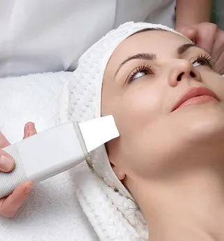 Beautiful Woman Getting a Facial Treatment | Newport Cove Dermatology in Newport Beach, CA